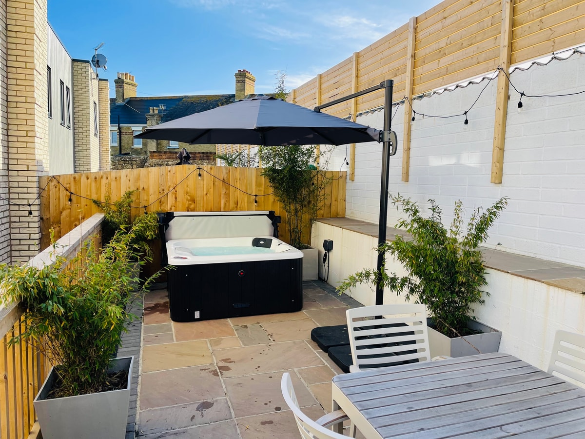 Private patio and hot tub at 11 Breakwater, Sandown