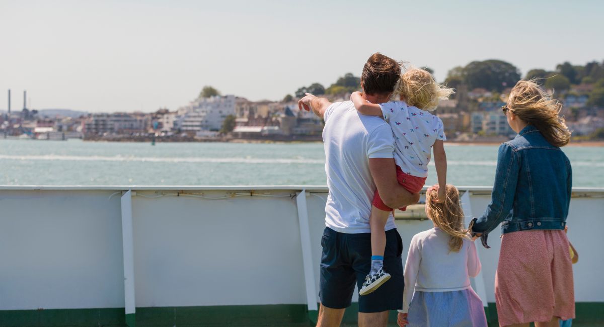 Family enjoying a ferry crossing to the Isle of Wight